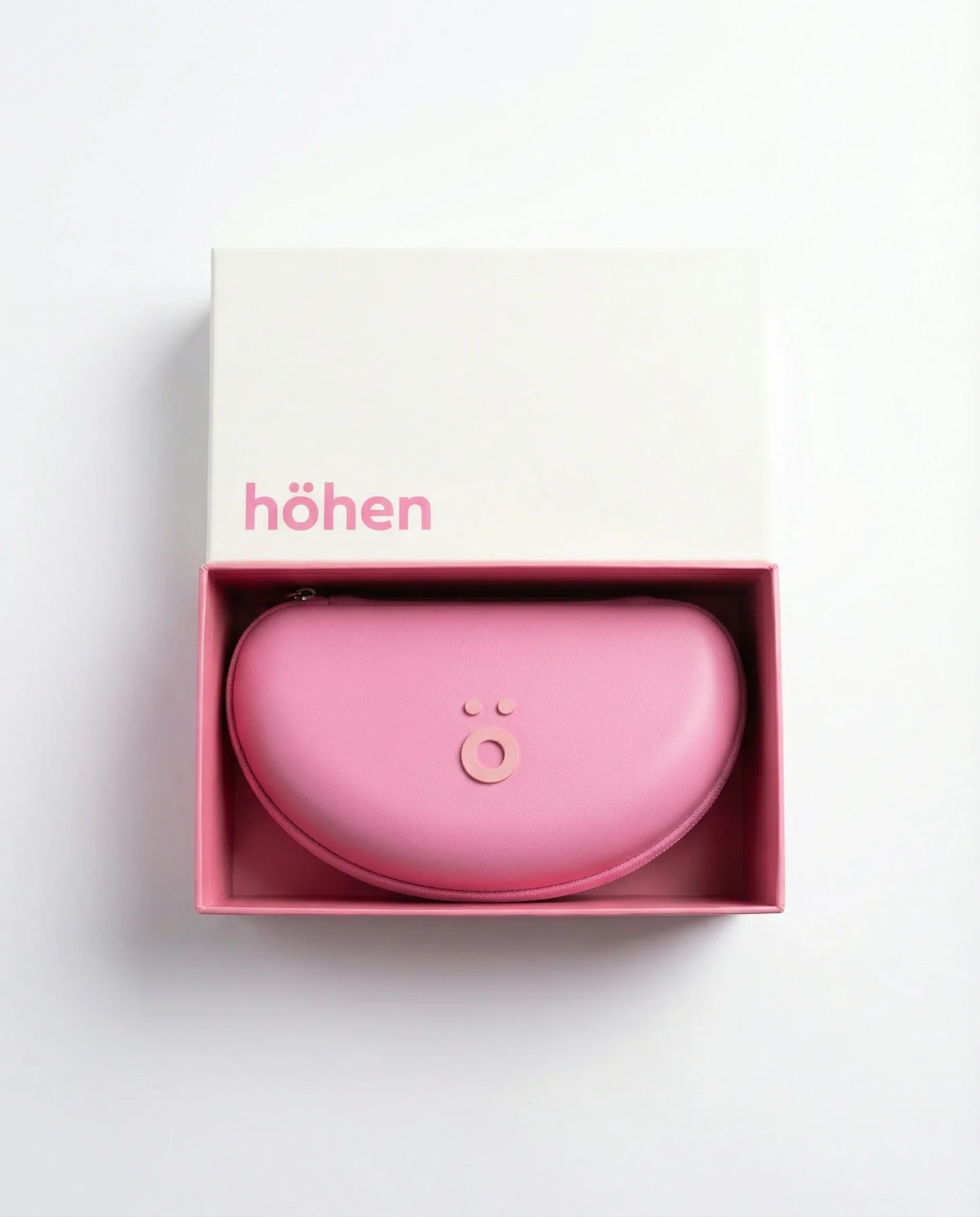 Pink hard case for höhen Aero sunglasses presented in a premium box with höhen logo.