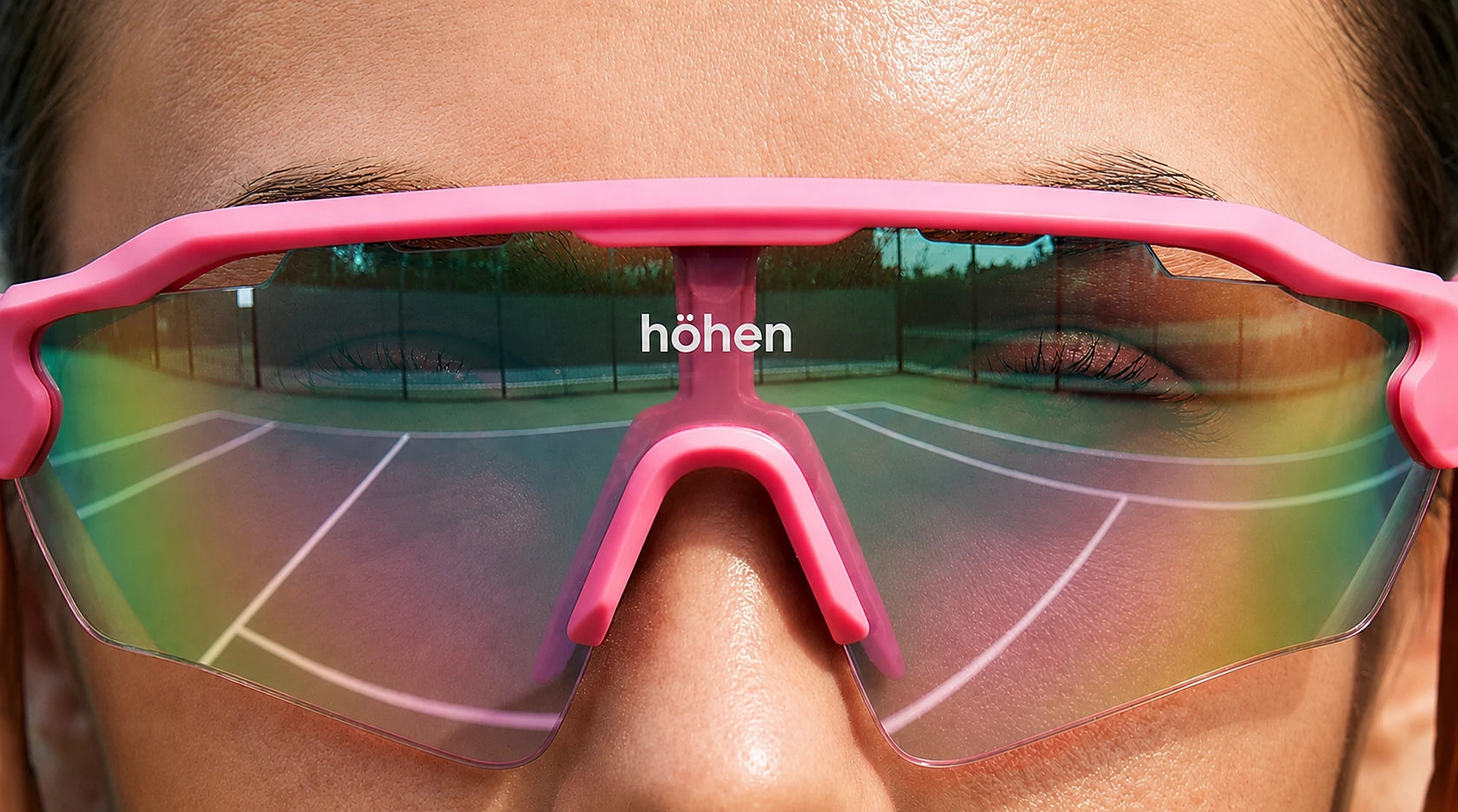 Close-up of höhen aero performance sunglasses with mirrored lenses, highlighting precision design, protection, and luxury sports aesthetics.